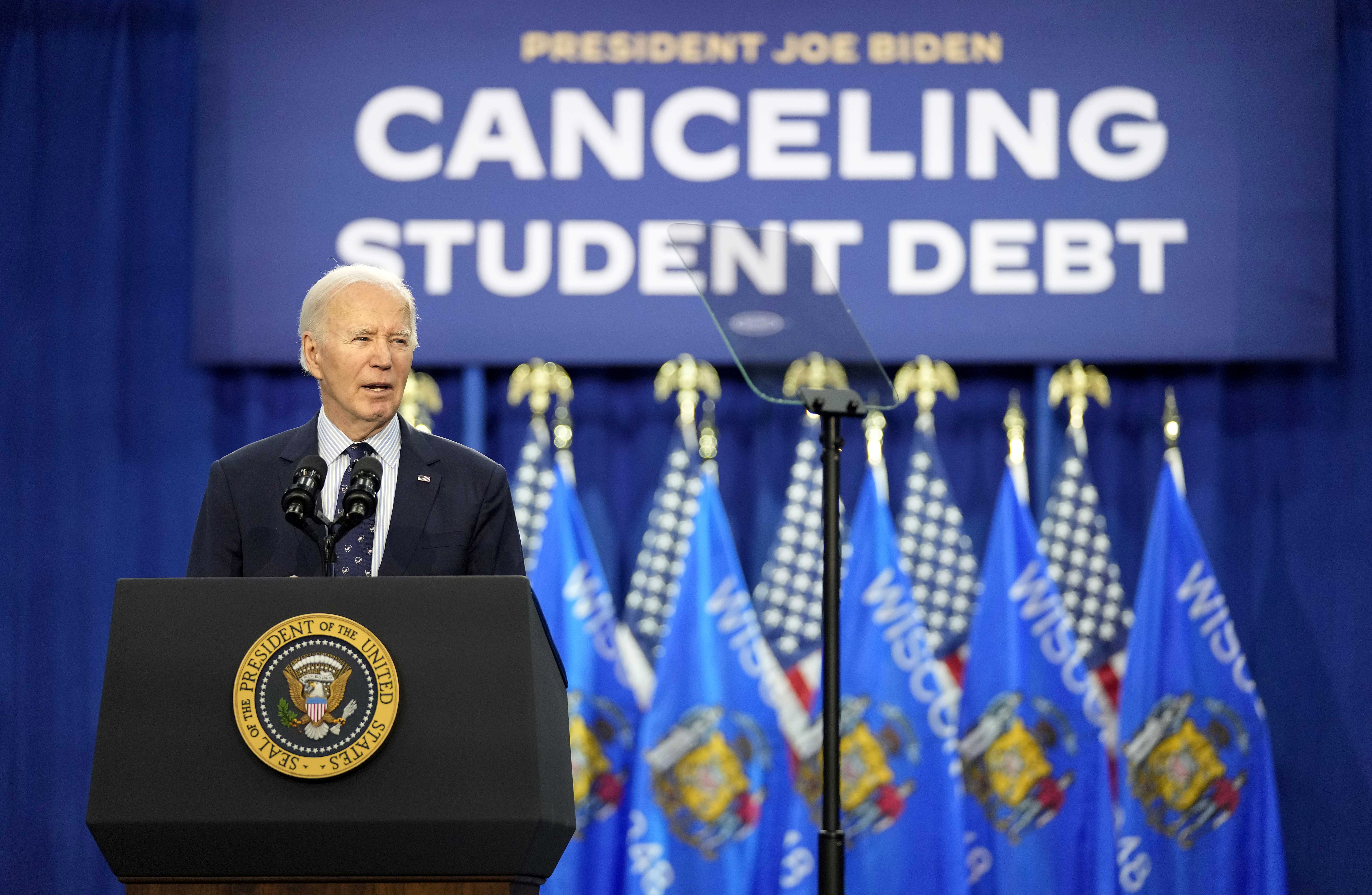 FILE - President Joe Biden speaks at an event about canceling student debt, at the Madison Area Technical College Truax campus, April 8, 2024, in Madison, Wis. Federal judges in Kansas and Missouri on Monday, June 24, blocked parts of a Biden administration student loan repayment plan that provides a faster path to cancellation and lower monthly payments for millions of borrowers. (AP Photo/Kayla Wolf, File)
