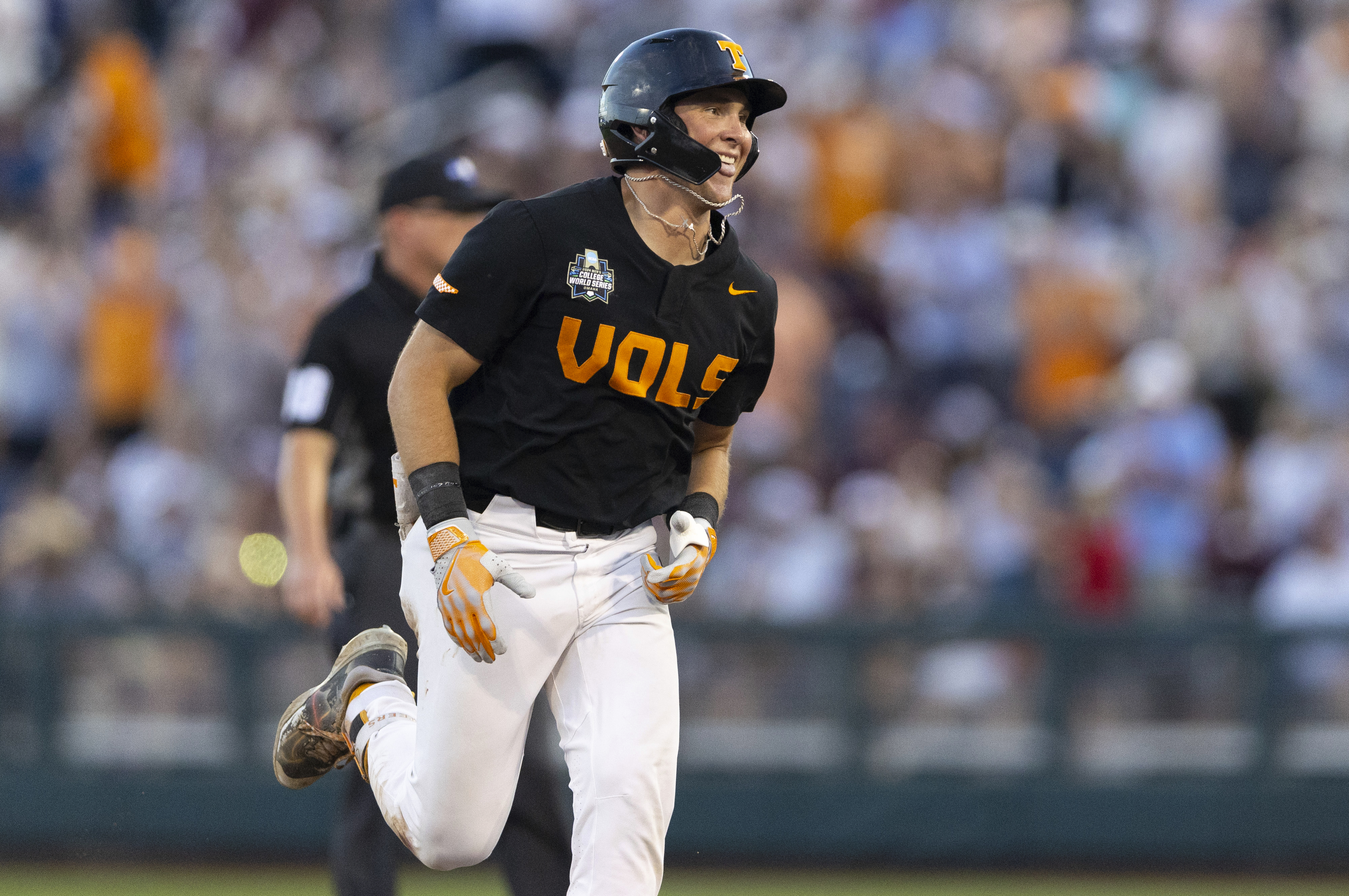 Tennessee's Dylan Dreiling rounds the bases after hitting a two-run home run against Texas A&M in the seventh inning of Game 3 of the NCAA College World Series baseball finals in Omaha, Neb., Monday, June 24, 2024. (AP Photo/Rebecca S. Gratz)
